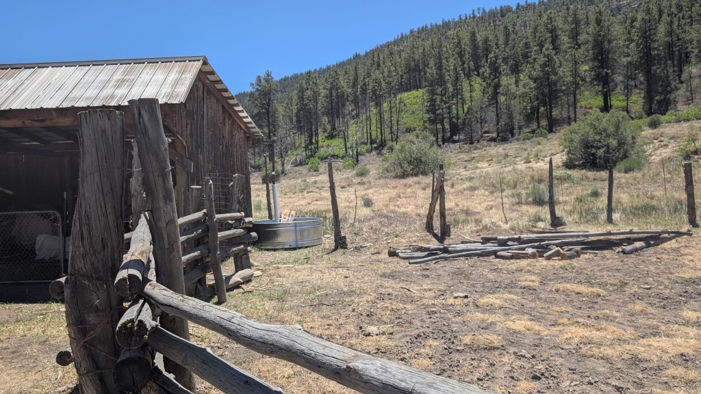 Barn water tank and repaired horse corral